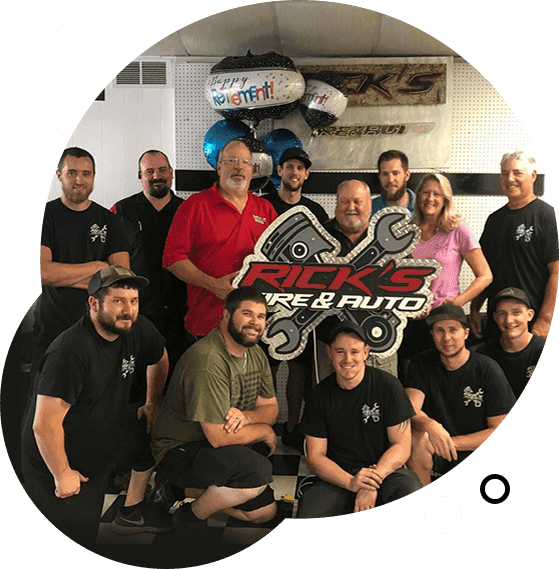 Rick's Tire & Auto team gathered inside the Mechanicsville shop